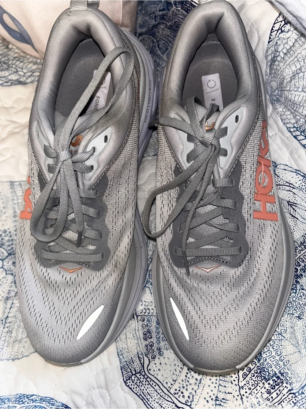 Hoka womens Gray Sneakers with Orange Logo Accents